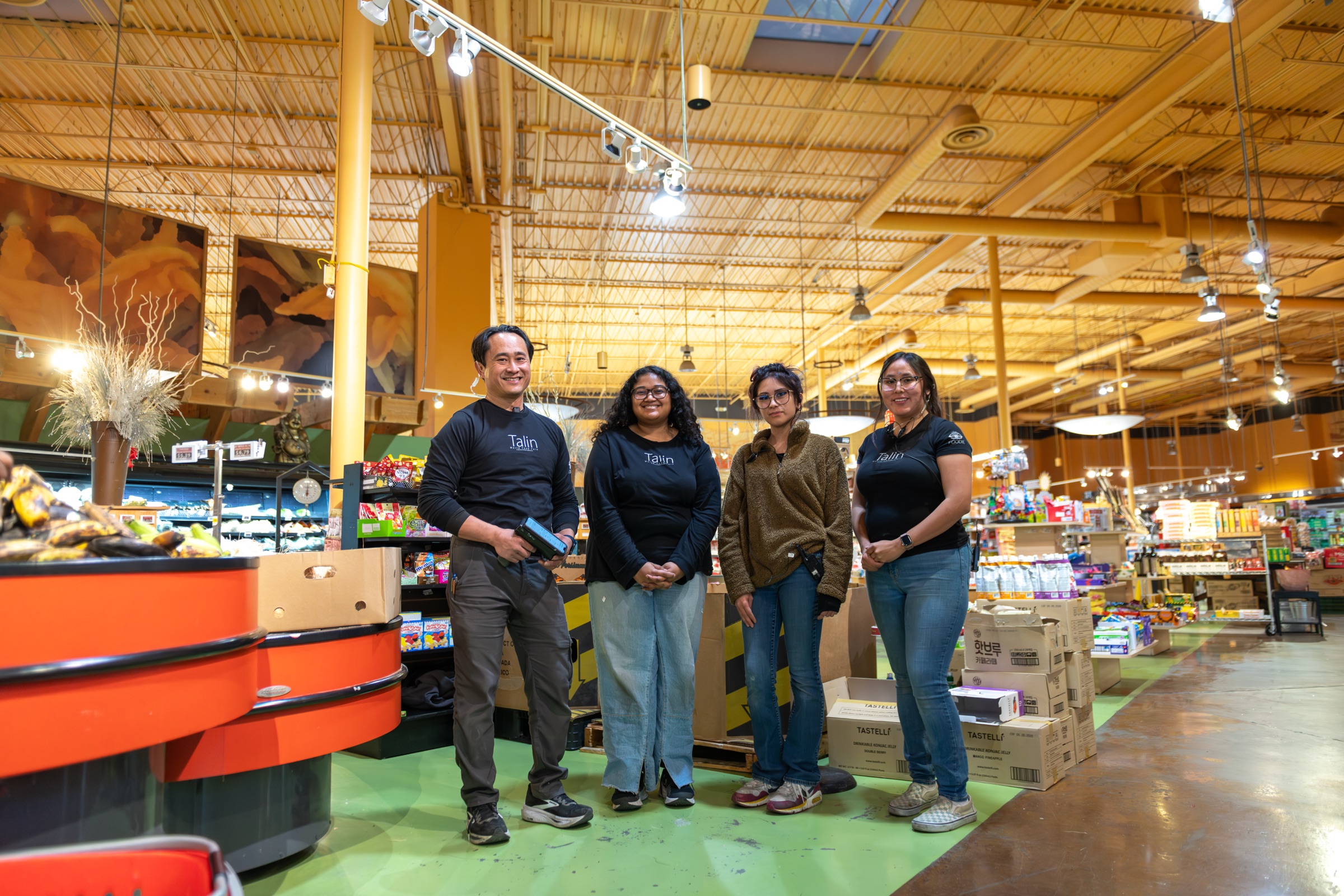 Victor Limary and the Talin Market team in store